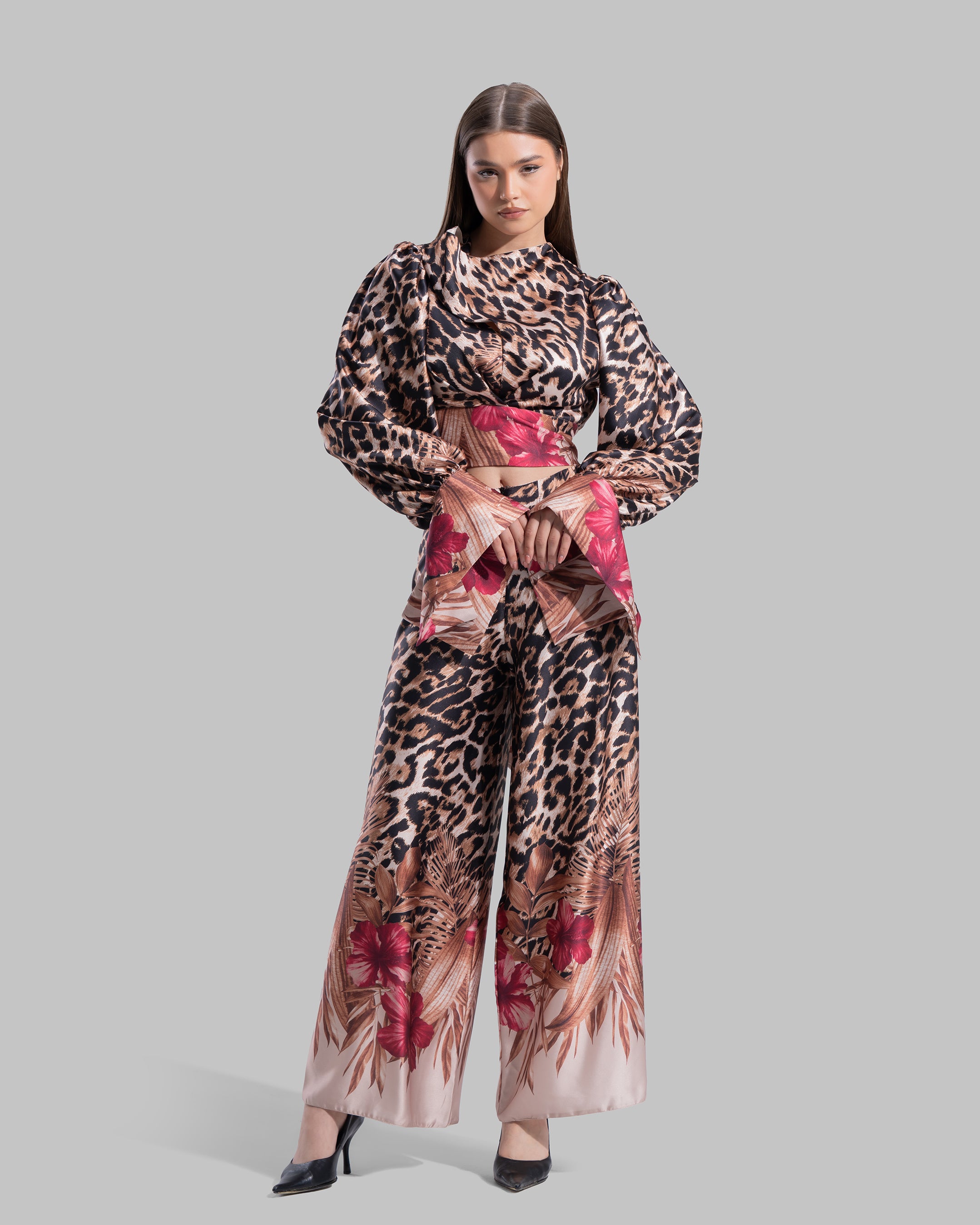 High-waisted pants featuring a bold leopard print.