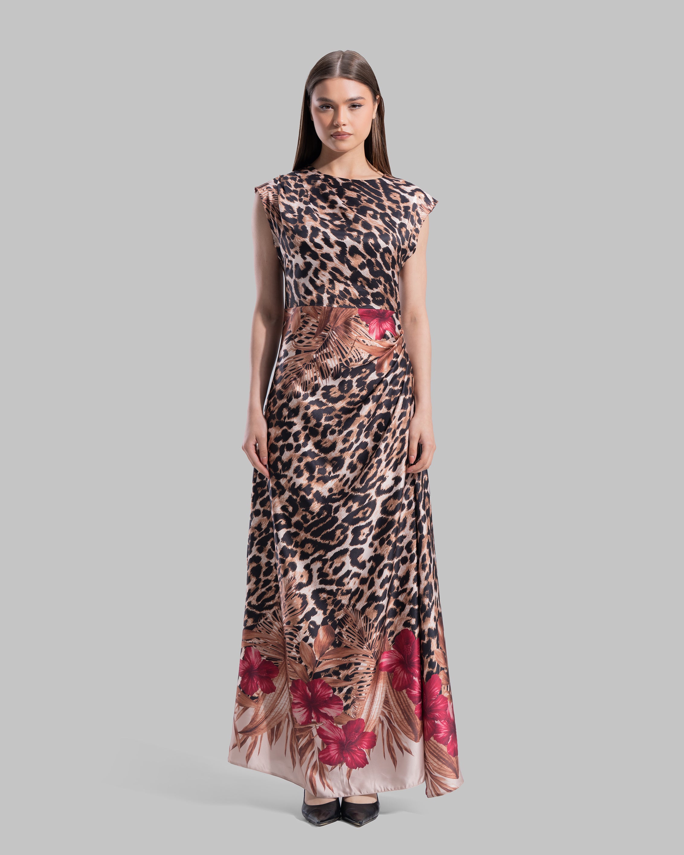 Sleeveless midi dress with a round neckline.