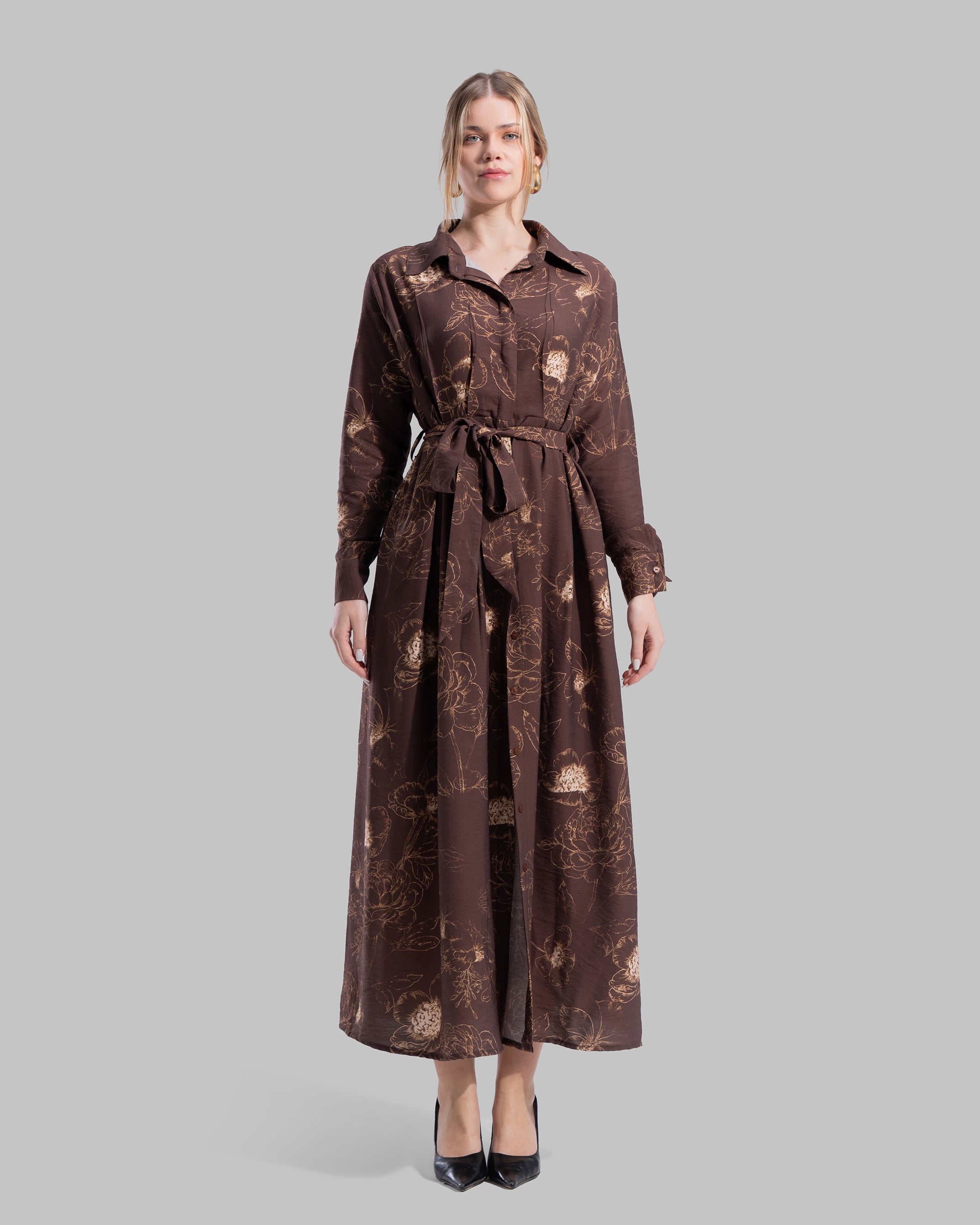 Floral print midi shirt dress with a matching tie belt at the waist.