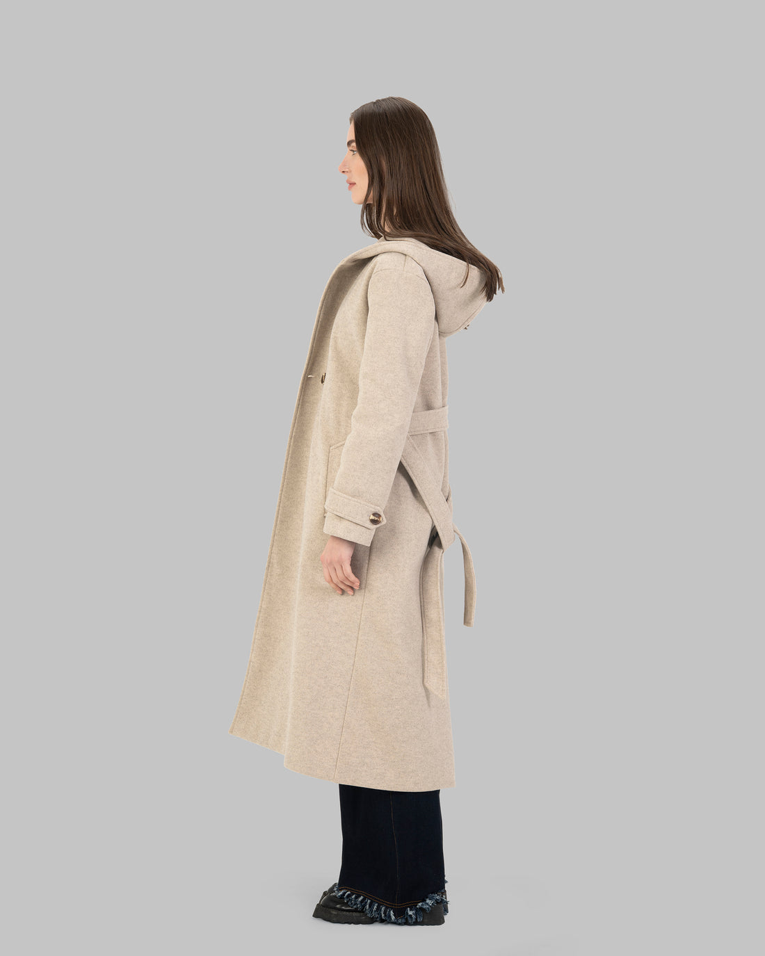 Long hooded coat in light beige with a belt waist