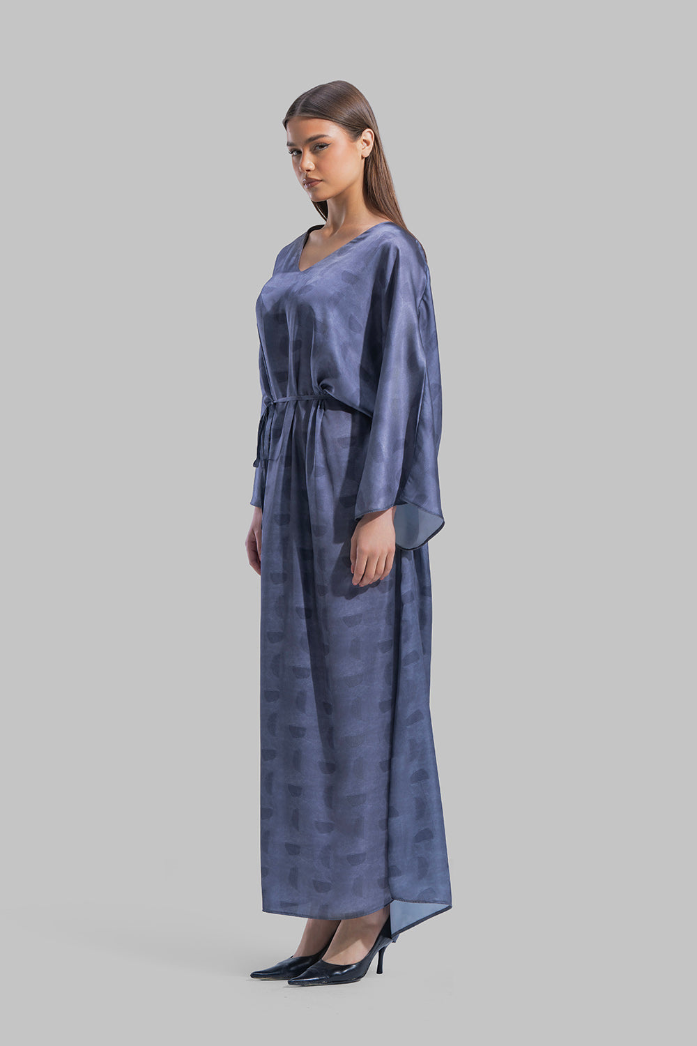 Oversized maxi dress featuring a V-neckline and wide kimono-style sleeves.