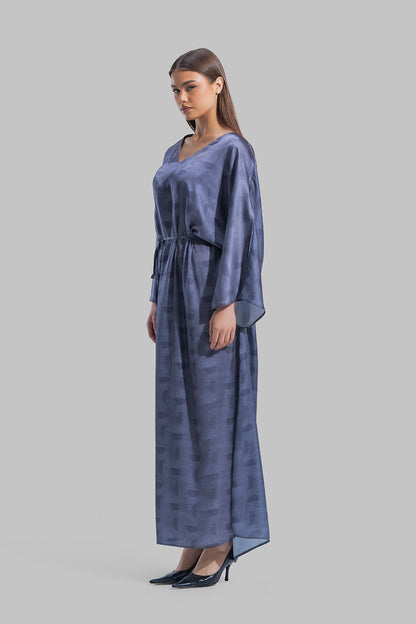 Oversized maxi dress featuring a V-neckline and wide kimono-style sleeves.