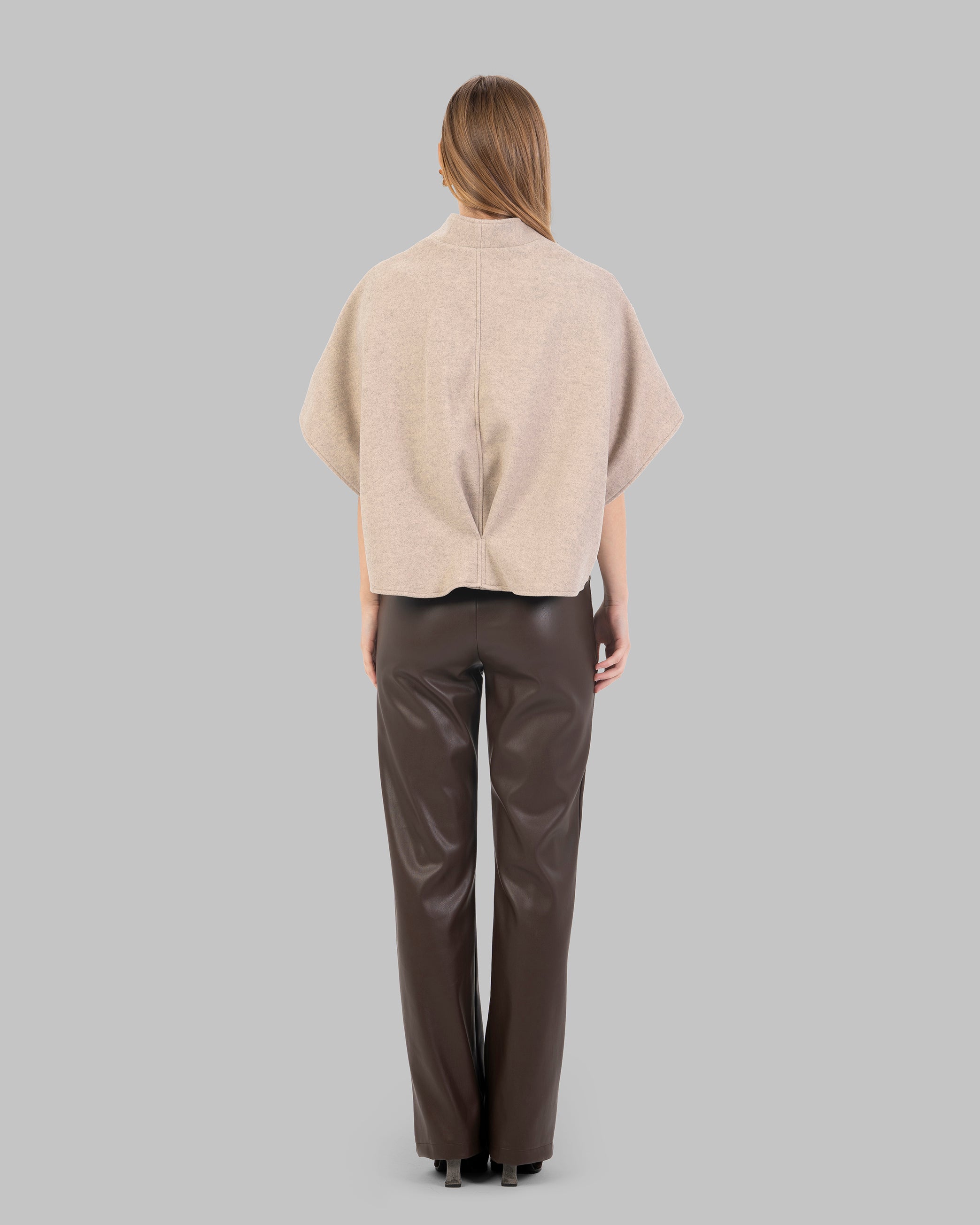 "Short Wool-Blend Cape Jacket  With Patch pocket."