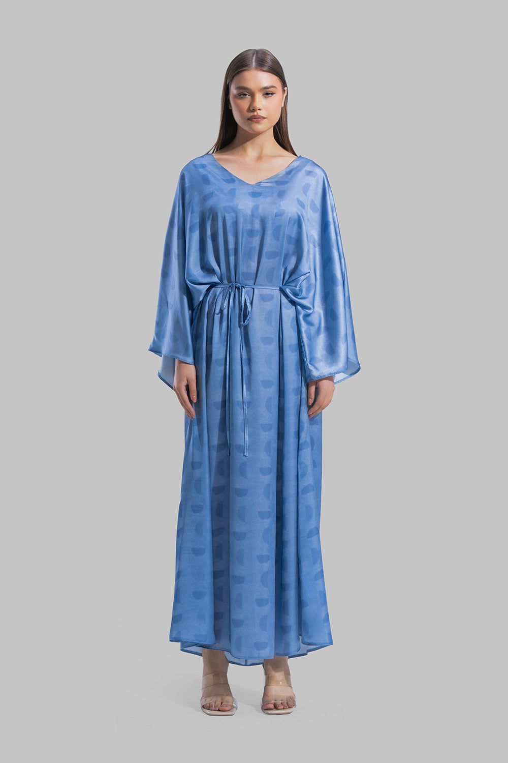 Oversized maxi dress featuring a V-neckline and wide kimono-style sleeves.