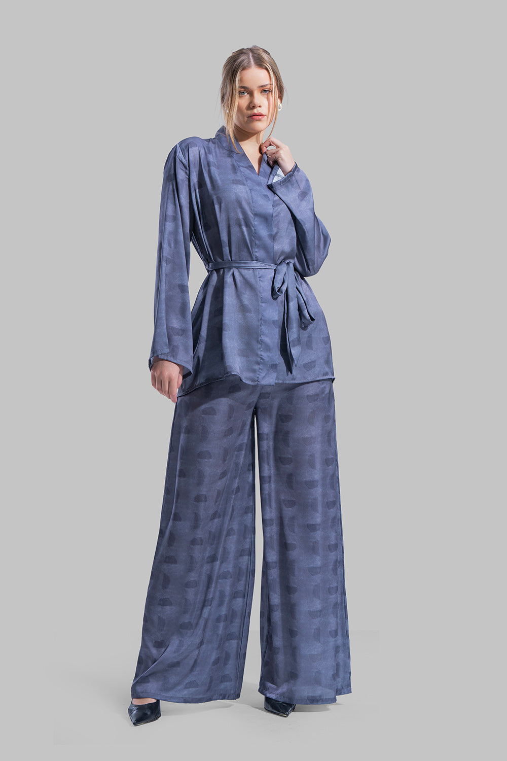 Long sleeve Cardigan with a wrap-style front.