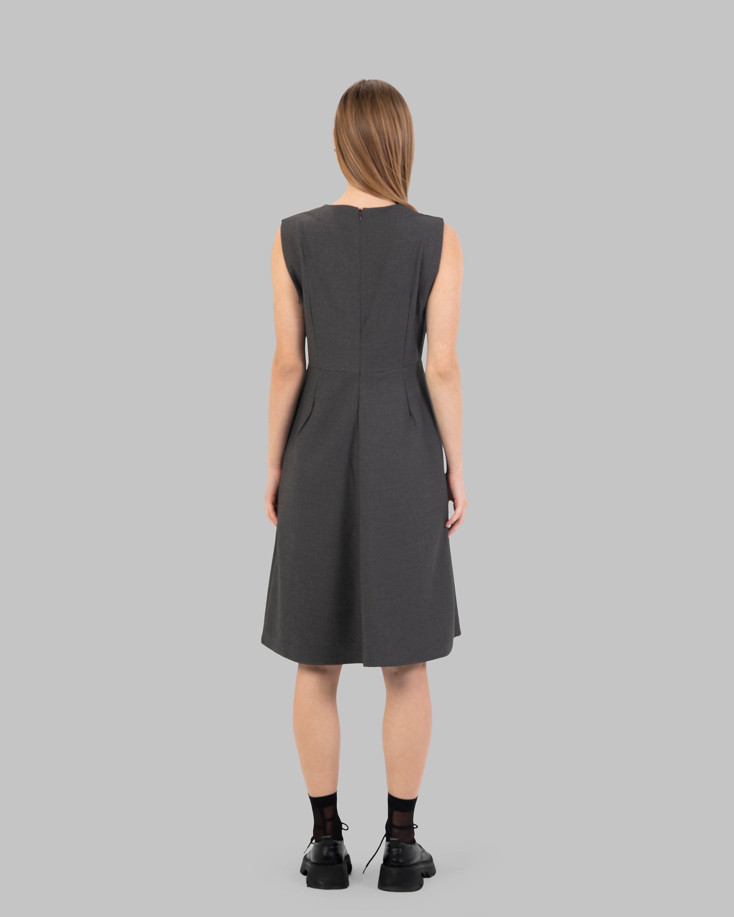 Tailored Sleeveless Dress with Asymmetric Draped