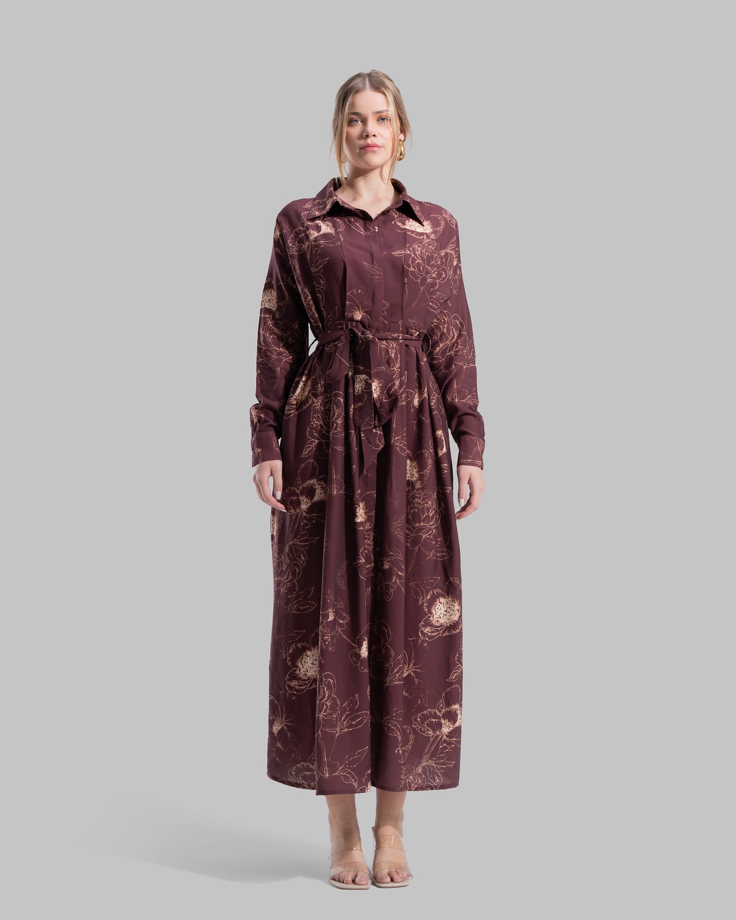 Floral print midi shirt dress with a matching tie belt at the waist.