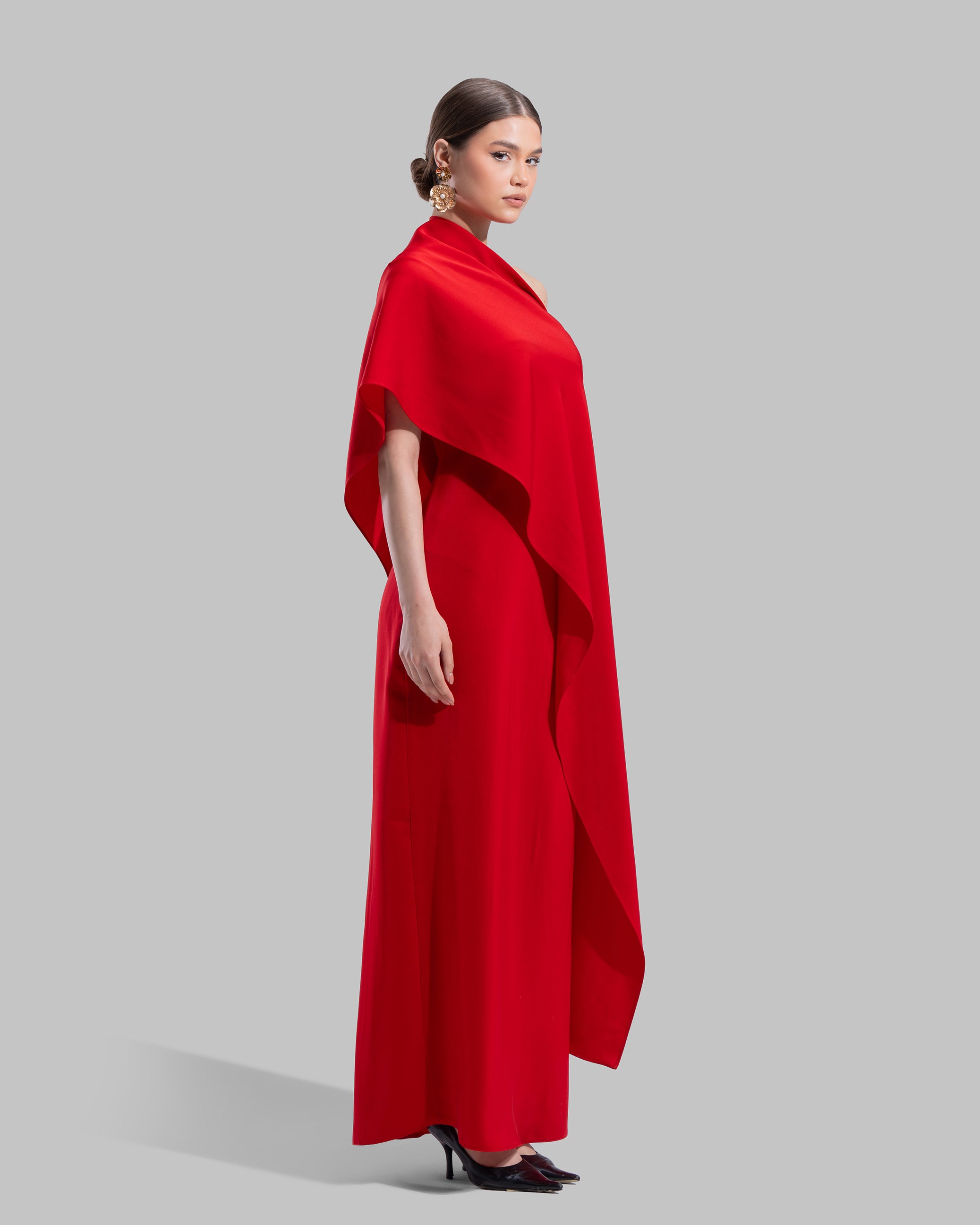 Draped asymmetrical neckline satin maxi dress with a fluid oversized silhouette.