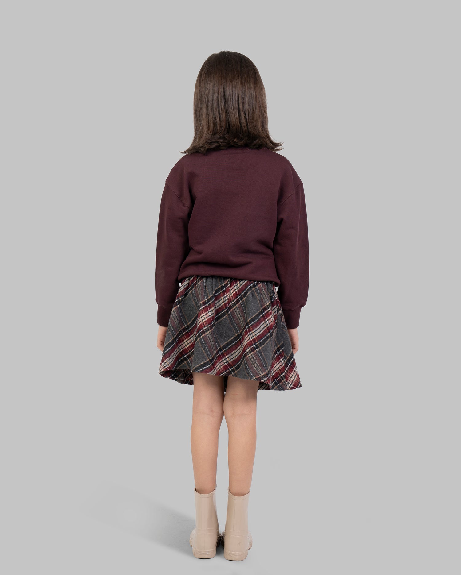 Short wrap-style skirt in a wool-blend plaid fabric