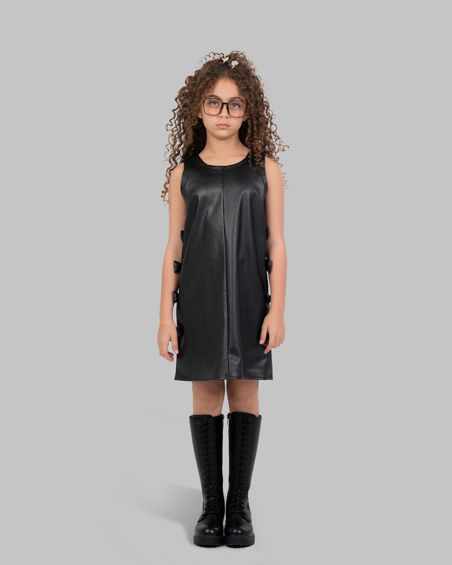 Leather Pinafore Dress with Side Bow Details.