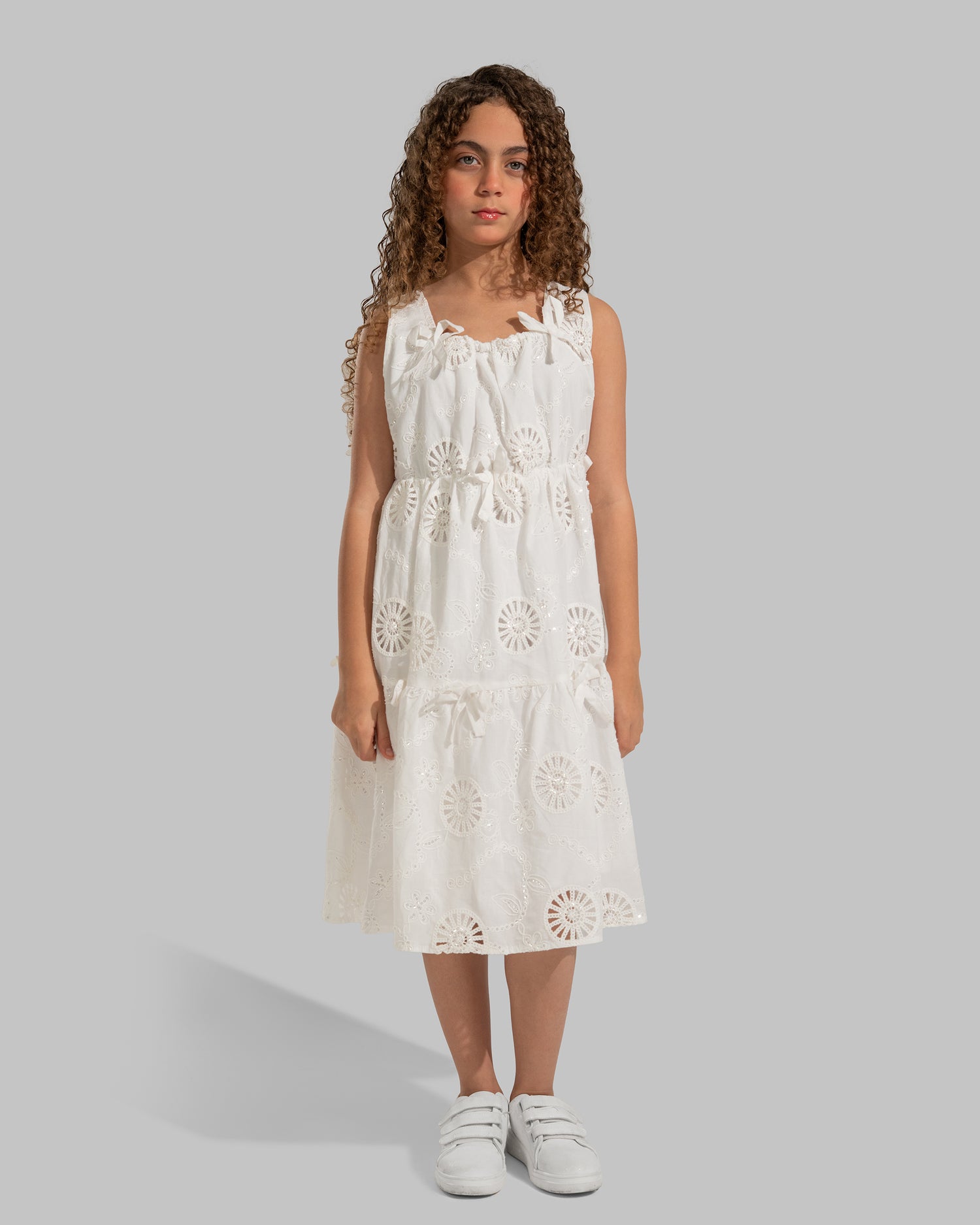 White eyelet midi dress with delicate bow details