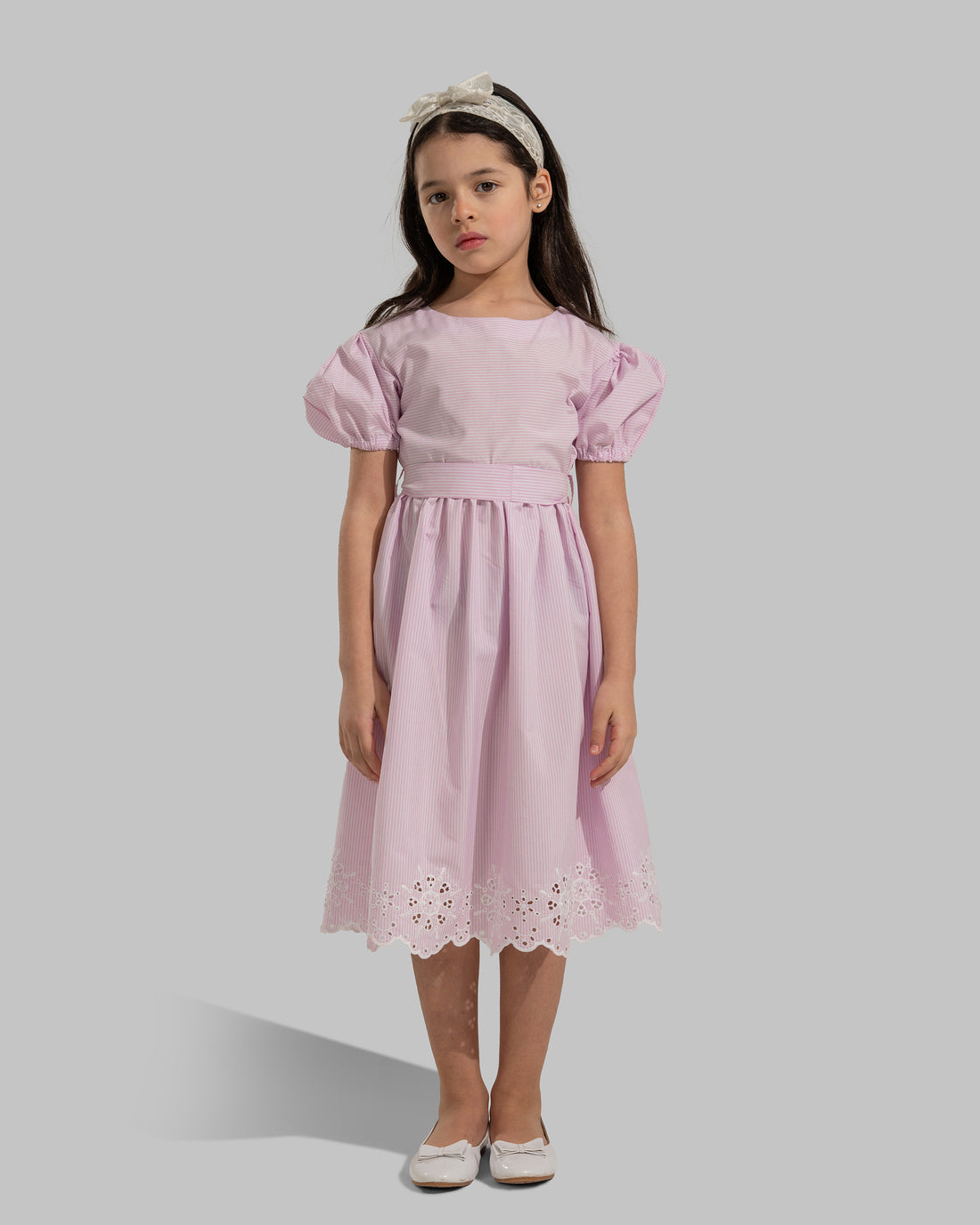 Striped puff-sleeve dress with a matching tie belt.